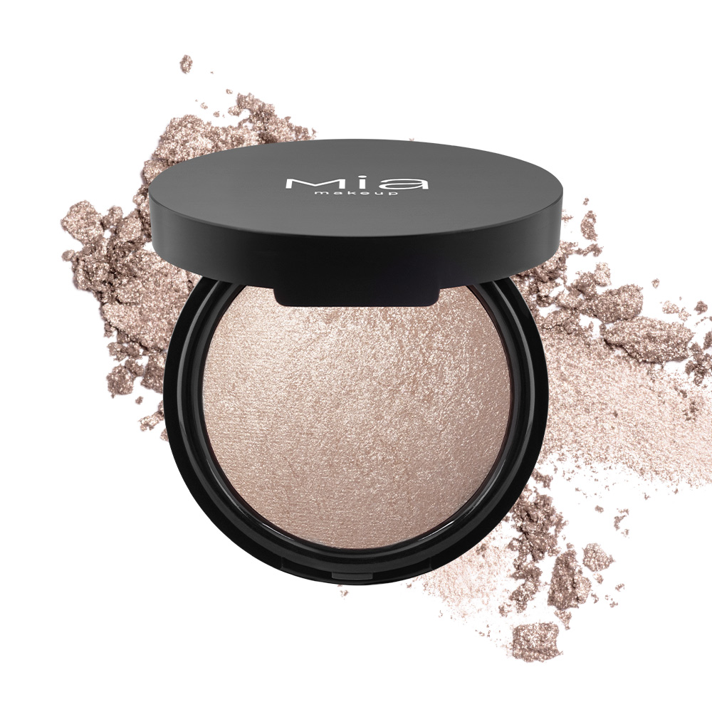 Η συσκευασία MIA Highlighter Sun Glaze 01-Aura, ανοιχτή, πάνω στο υλικό της.